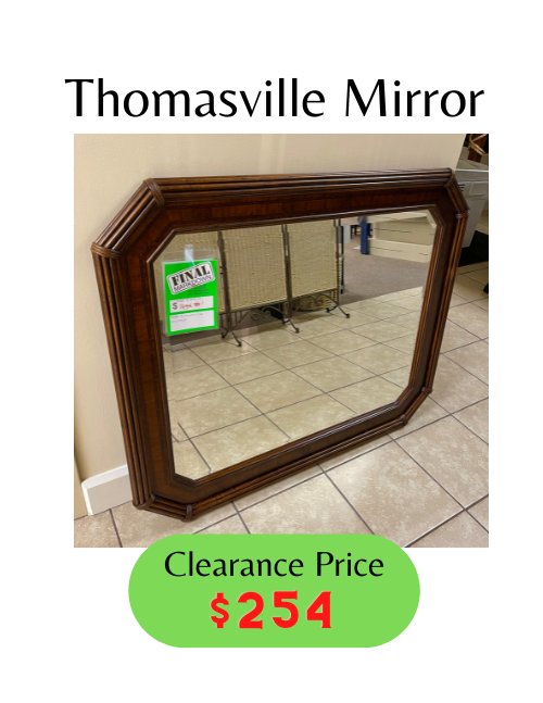large dark-wood framed beveled mirror