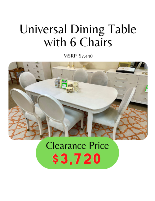 light gray oval dining table with 6 matching chairs with upolstered seat in gray velvet